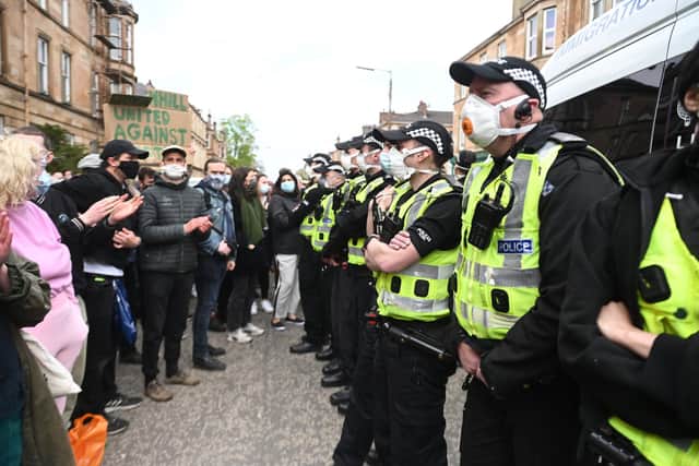 Police are keeping the public back from the van