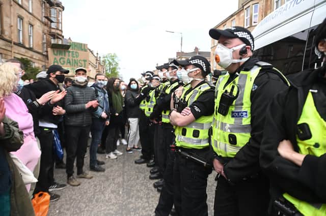 Police are keeping the public back from the van