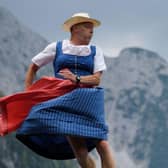 A man takes part in the "Dirndl-Flugtag" event in Mittenwald, southern Germany, wearing an outfit popular in Bavaria, which, says reader, has a similar status to Scotland (Picture: Angelika Warmuth/DPA/AFP via Getty Images)