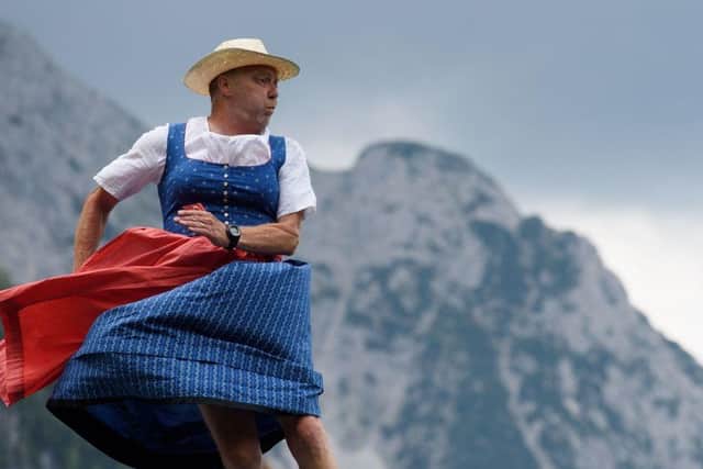 A man takes part in the "Dirndl-Flugtag" event in Mittenwald, southern Germany, wearing an outfit popular in Bavaria, which, says reader, has a similar status to Scotland (Picture: Angelika Warmuth/DPA/AFP via Getty Images)