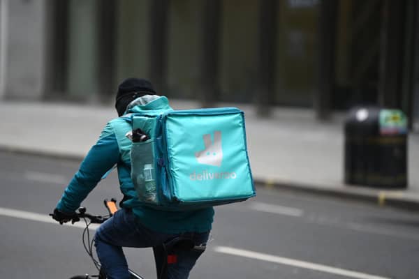 Deliveroo, like other businesses that rely on people having more money than time, is finding times are tough (Picture: Daniel Leal/AFP via Getty Images)