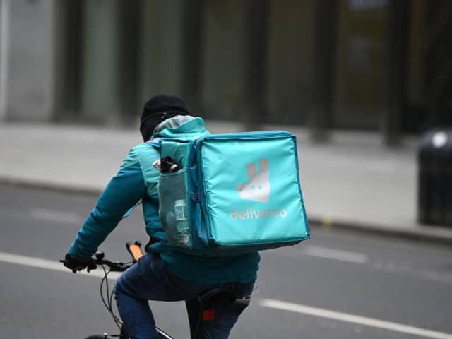Deliveroo, like other businesses that rely on people having more money than time, is finding times are tough (Picture: Daniel Leal/AFP via Getty Images)