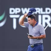 Richard Bland acknowledges the crowd on the ninth green after completing his second round in the Hero Dubai Desert Classic at Emirates Golf Club. Picture: Warren Little/Getty Images.