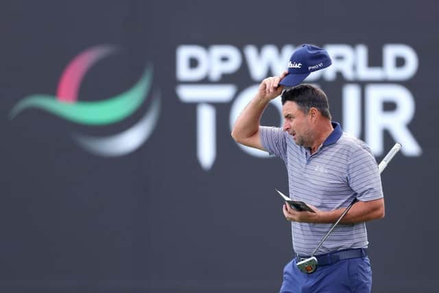 Richard Bland acknowledges the crowd on the ninth green after completing his second round in the Hero Dubai Desert Classic at Emirates Golf Club. Picture: Warren Little/Getty Images.