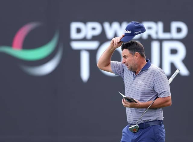 Richard Bland acknowledges the crowd on the ninth green after completing his second round in the Hero Dubai Desert Classic at Emirates Golf Club. Picture: Warren Little/Getty Images.