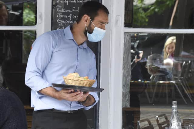 Summer jobs such as waiting tables are available if people are prepared to look for them, says a reader