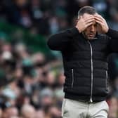 Morton manager Dougie Imrie with his hands on his head during the 5-0 defeat to Celtic. (Photo by Ross MacDonald / SNS Group)
