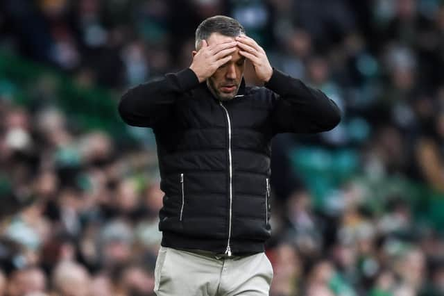 Morton manager Dougie Imrie with his hands on his head during the 5-0 defeat to Celtic. (Photo by Ross MacDonald / SNS Group)