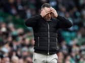 Morton manager Dougie Imrie with his hands on his head during the 5-0 defeat to Celtic. (Photo by Ross MacDonald / SNS Group)
