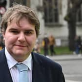 Conservative MP Jamie Wallis issued a statement saying 'I'm trans. Or to be more accurate, I want to be be' (Picture: Justin Tallis/AFP via Getty Images)
