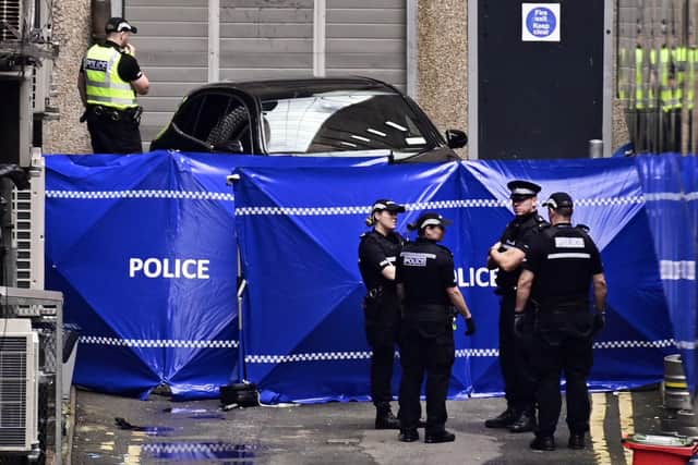 Wellington Street in Glasgow is currently closed off to the public as a heavy police presence remains on the scene.