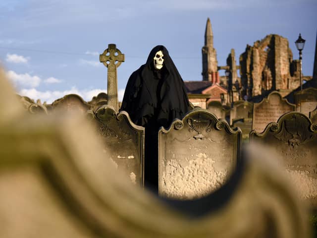 Scots meet the Grim Reaper three years earlier than people in England, according to new figures (Picture: Oli Scarff/AFP via Getty Images)