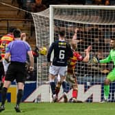 Partick Thistle striker Brian Graham scored twice as the Jags downed Dundee 3-1 at Dens Park.