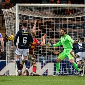 Partick Thistle striker Brian Graham scored twice as the Jags downed Dundee 3-1 at Dens Park.