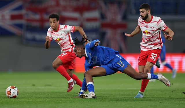 LEIPZIG, GERMANY - APRIL 28: Joe Aribo of Rangers is challenged by Tyler Adams and Josko Gvardiol of RB Leipzig during the UEFA Europa League Semi Final Leg One match between RB Leipzig and Rangers at Football Arena Leipzig on April 28, 2022 in Leipzig, Germany. (Photo by Maja Hitij/Getty Images)