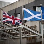 The Union flag, Saltire and EU flag fly outside the Scottish Parliament in Edinburgh. Picture: PA