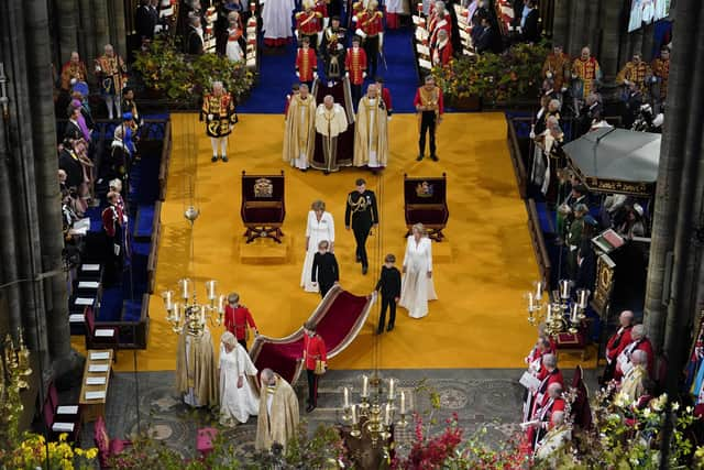 Queen Camilla and King Charles III arrive for their coronation at Westminster Abbey, London.