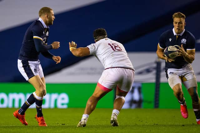 Finn Russell offloads to Duhan van der Merwe for the winger's second half try. Picture: Craig Williamson/SNS