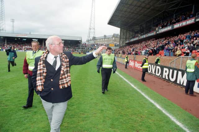 Dundee Utd manager Jim McLean waves to fans after his last game in charge against Aberdeen in 1993