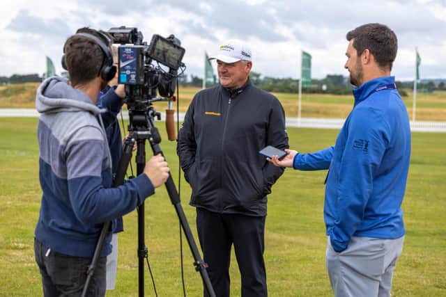 Paul Lawrie, the 1999 Open champion at Carnoustie, conducts an interview ahead of the Senior Open presented by Rolex. Picture: Kenny Smith/Getty Images.