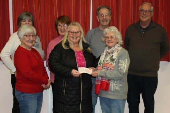 Longside Churches Together handed over more than £2300.