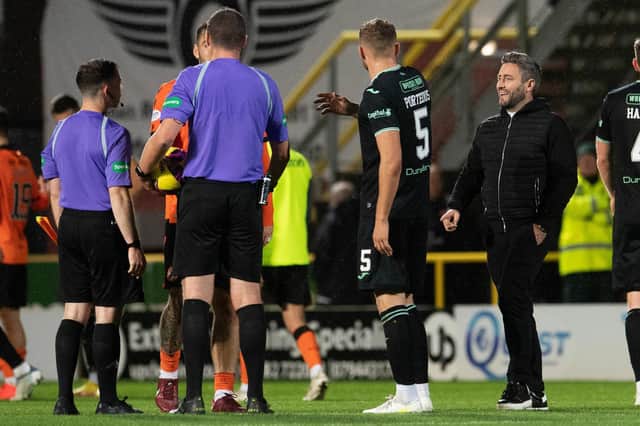 Hibs manager Lee Johnson laughs at the referee during a cinch Premiership match between Dundee United and Hibernian at Tannadice, on Ocrober 11, 2022, in Dundee, Scotland.  (Photo by Ross Parker / SNS Group)
