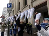 Campaigners hang notes that read "Right for education is a basic human right", in different languages outside Berlin's education administration building to demand access to local schools for refugees. According to Fluechtlingsrat-Berlin, an organisation that campaigns for refugee rights, at least 1,500 refugee children and youth are still waiting to be allotted a spot in a local school, despite promises from city officials and German law that requires refugees to be given education.