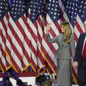 Donald Trump arrives on stage with his wife Melania and their son Barron.