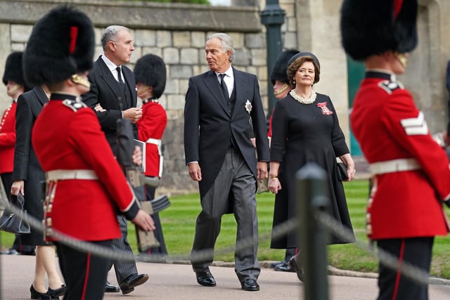 Former Prime Minister Sir Tony Blair (centre) and wife Cherie arrive for the Committal Service for Queen Elizabeth II held at St George's Chapel in Windsor Castle, Berkshire. Picture date: Monday September 19, 2022.