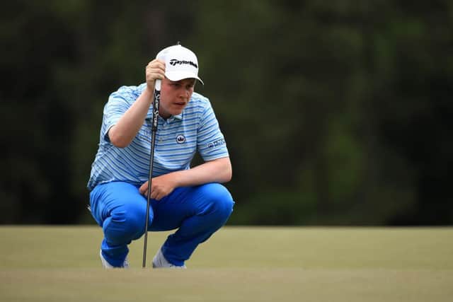 Bob MacIntyre lines up a putt on the 18th green during the first round of the Masters at Augusta National Golf Club. Picture: Mike Ehrmann/Getty Images.