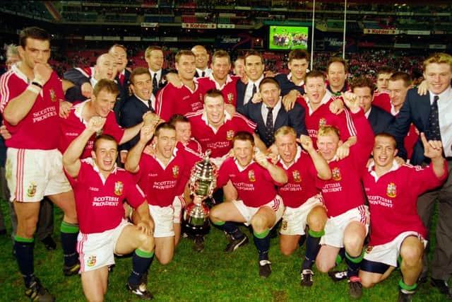 The Victorious British Lions celebrate their 2-1 series victory over the South Africa Springboks after the Third Test Match at Ellis Park on July 5, 1997 as chronicled in the new book.  (Photo by David Rogers/Allsport/Getty Images)