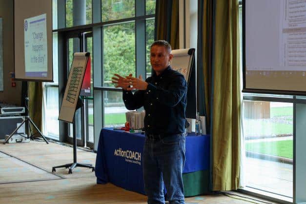 Award-winning business coach Alan Smith guiding others to success.