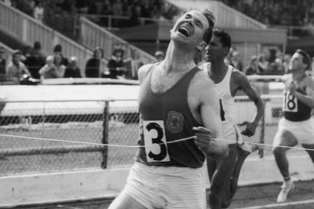 Ming Campbell wins the 220 yards final in a time of 21.1 seconds at the AAA Championships at White City in July 1964. (Photo by Roger Jackson/Central Press/Hulton Archive/Getty Images).