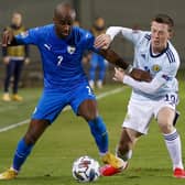 Israel defender Eli Dasa (L) is marked by Scotland midfielder Callum McGregor during the UEFA Nations League B Group 2 match at the Netanya Municipal Stadium on November 18, 2020. (Photo by JACK GUEZ/AFP via Getty Images)