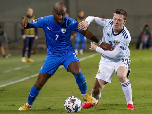 Israel defender Eli Dasa (L) is marked by Scotland midfielder Callum McGregor during the UEFA Nations League B Group 2 match at the Netanya Municipal Stadium on November 18, 2020. (Photo by JACK GUEZ/AFP via Getty Images)