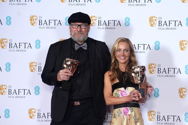 Ian Stokell and Lesley Paterson won the best adapted screenplay honour at BAFTA Film Awards. Picture: Dominic Lipinski/Getty Images