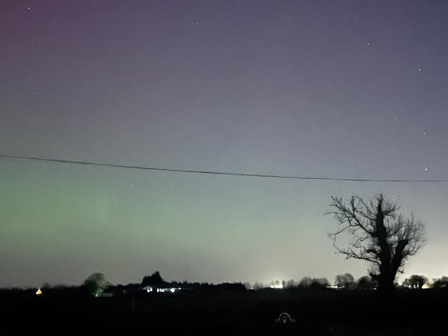 The moving patterns of green, blue, purple and red are caused by solar storms on the surface of the sun, which create clouds of electrically charged particles that are forcefully expelled.