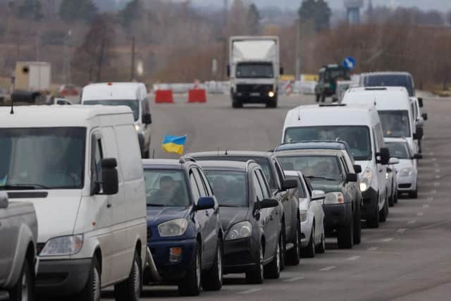 Thousands of Ukrainians fled the country in their cars when war broke out nearly a year ago.