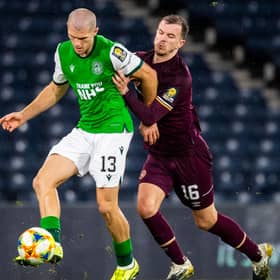 Hibs' Alex Gogic tussles with Hearts' Andy Halliday during Saturday's Scottish Cup semi-final. Photo by Ross Parker/SNS Group