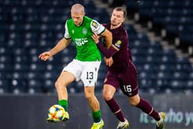 Hibs' Alex Gogic tussles with Hearts' Andy Halliday during Saturday's Scottish Cup semi-final. Photo by Ross Parker/SNS Group
