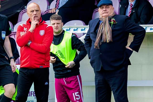 Campbell and his brother Ian on the touchline.