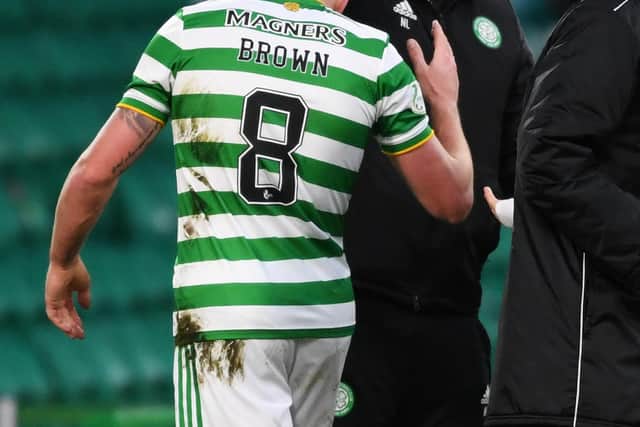 Neil Lennon acknowledges Scott Brown as he is subbed during Saturday's win over Motherwell. The Celtic manager accepts that his captain's influence this season hasn't been as before, but believes he still has plenty to offer. (Photo by Ross MacDonald / SNS Group)