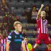 Shaun Rooney celebrates after putting St Johnstone ahead at Dens Park. (Photo by Ross Parker / SNS Group)