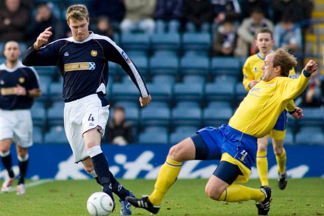 Kevin McDonald (left) in action in 2008 for first club Dundee against Queen of the South