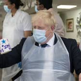 Prime Minister Boris Johnson during a visit to Westport Care Home in Stepney Green, east London, ahead of unveiling his long-awaited plan to fix the broken social care system. PA Wire