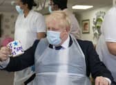 Prime Minister Boris Johnson during a visit to Westport Care Home in Stepney Green, east London, ahead of unveiling his long-awaited plan to fix the broken social care system. PA Wire
