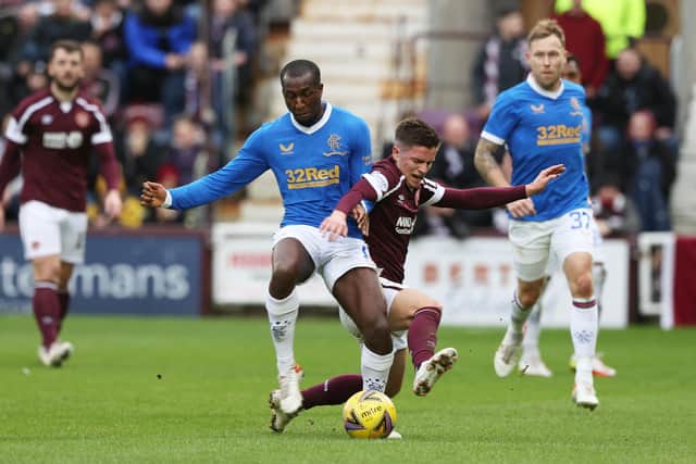 Rangers' Glen Kamara (left) tussles with Hearts' Cammy Devlin during a match earlier in the season between the two teams.