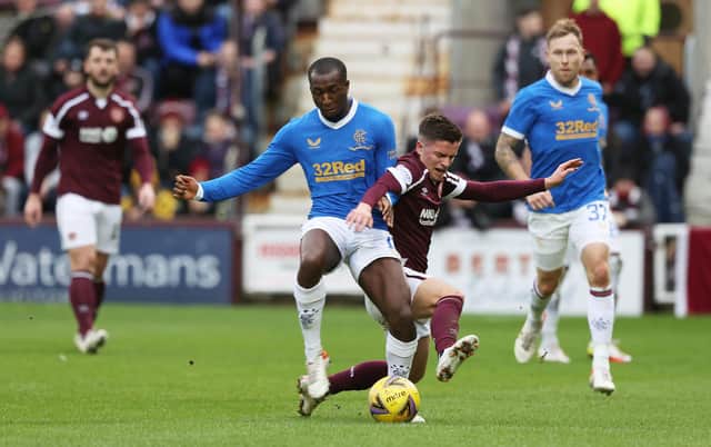Rangers' Glen Kamara (left) tussles with Hearts' Cammy Devlin during a match earlier in the season between the two teams.
