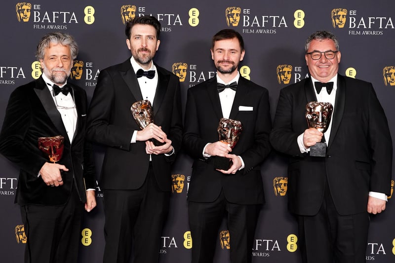 Paul Lambert, Stephen James, Gerd Nefzer and Rhys Salcombe in the press room after winning the Best Special Visual Effects award for Dune: Part Two