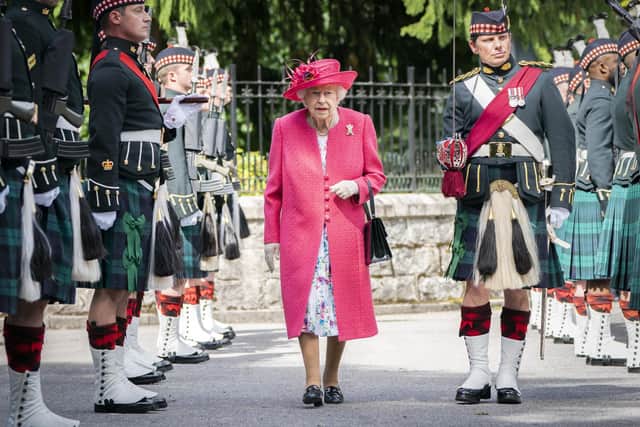 Queen Elizabeth II during an inspection of the Balaklava Company, 5 Battalion The Royal Regiment of Scotland at the gates at Balmoral, as she takes up summer residence at the castle.